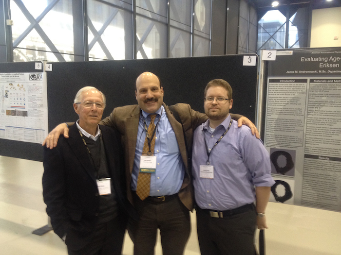 John Skedros with Sam Stout (left) and David Cooper (right) in 2014.
